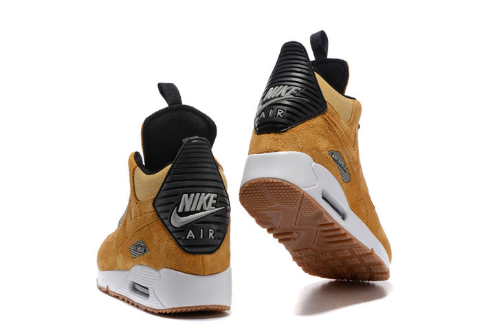 Rear view of tan Nike Air Max 90 high-top shoes with black heel panels and white midsoles