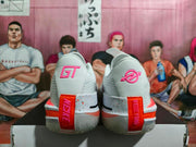 Rear view of white Nike GT basketball shoes with pink and orange-red heel accents on a shoebox.
