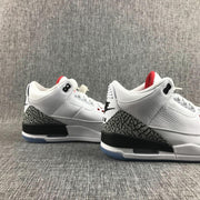 Rear-side view of the pair showing elephant-print heel panels, black midsole sections, and translucent outsoles.