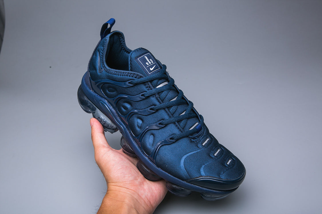 Single blue Nike Air VaporMax Plus TN-15 sneaker shown from above at an angle.