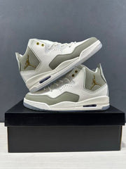 Two Jordan Courtside 23 sneakers arranged to show their side panels, lace-up fronts and translucent outsoles.
