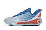 Side profile of the blue and light gray sneaker showing its sculpted sole and contrasting heel detail.