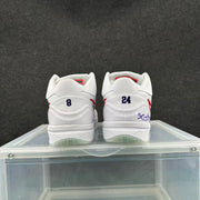 Rear view of the sneakers showing heel numbers 8 and 24 and additional graphic details.