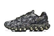Side profile showing the patterned upper, side Swoosh, and rounded sole cushioning elements.