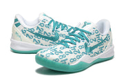Pair of white and teal Kobe 8 Protro shoes.