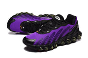 Pair of purple and black Nike Air Max DN8 sneakers in a three-quarter view.