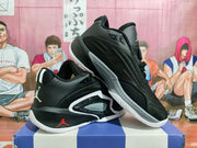 Angled view of black Jordan basketball shoes showing the side panels and outsole