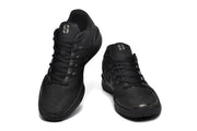 Pair of black low-cut basketball shoes viewed from the front