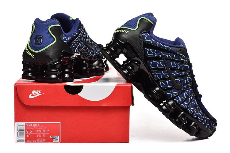 Nike Shox TL sneakers on a box; the box label shows a sample size.