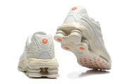 Rear and outsole views of Nike Shox Ride 2 sneakers with sculpted heel cushioning.