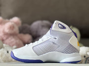 Opposite side view showing the white high-top sneaker’s purple outsole, padded collar, and side panel detailing.