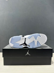 Outsole view showing translucent sections, traction pods, and a central Jordan logo.