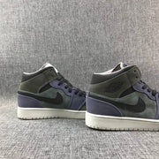 Rear-side view of the pair showing purple heel panels, gray collars, and white midsoles.
