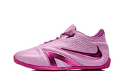 Side view of a pink basketball shoe with a metallic magenta Swoosh