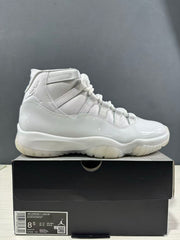 Side view of a white high-top sneaker with Jordan branding and the product box label visible below.
