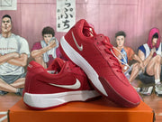 Angled view of red Nike sneakers showing white side branding, red laces, and white midsoles.