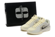 Nike Kobe 5 Protro shoes beside a black presentation box