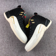 Top-down view of the pair showing black uppers, multicolor collar panels, gold hardware, and light-colored midsoles.