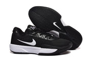 Side and outsole view of the Nike sneakers showing the white side logo and black traction pattern.