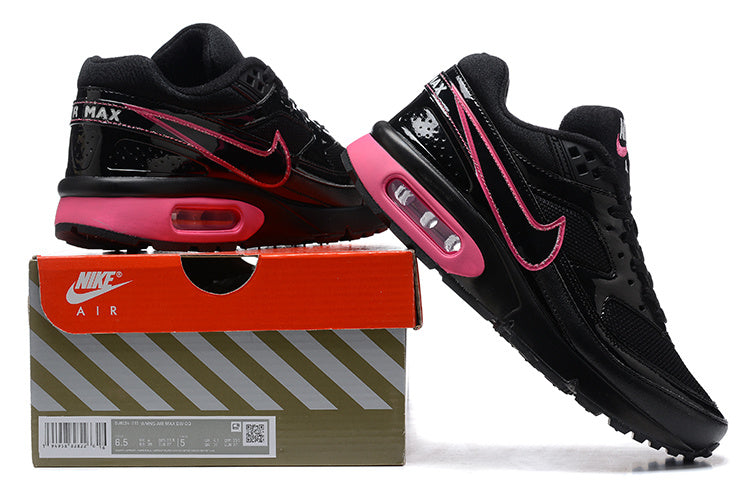 Black and pink Nike Air Max BW sneakers shown with a Nike Air shoebox