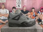 Single gray and black high-top sneaker shown in side profile, with layered panels, a structured midsole, and a visible air-style window.