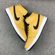 Top-down view of the pair showing yellow uppers, black Swooshes, and white midsoles.