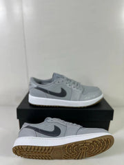 Side and outsole view showing the low-top profile, white midsole, and patterned gum traction sole.