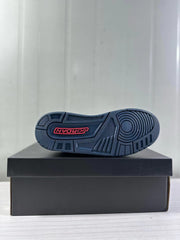 Bottom view showing the dark navy patterned outsole with Jordan branding.