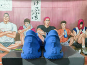 Rear view of the blue Nike Air Max 1000 sneakers showing the textured heel panels and outsole tread.
