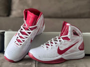 Pair of white and red high-tops showing the laces, tongues, and patterned uppers.