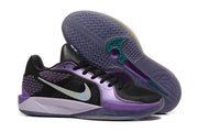Purple and black Nike Sabrina 2 basketball shoes with teal outsole details