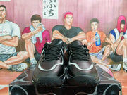 Front view showing the laces and toe panels of the sneakers