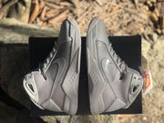 Overhead side-by-side view highlighting the matching gray uppers, off-white overlays, Swoosh logos, and outsole edges.