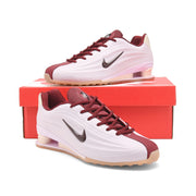 Pink Nike Shox Z R2 sneakers with burgundy and cream accents