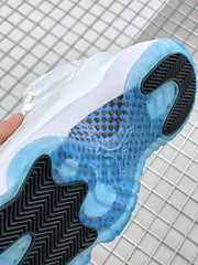 Close-up of the translucent blue outsole and black traction sections.