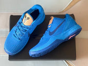 Angled overhead view of the blue Kobe 6 shoes showing the tongues and outsoles.