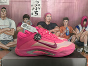 Side profile of a pink Nike sneaker showing layered panels, burgundy Swoosh branding and sculpted outsole detailing.