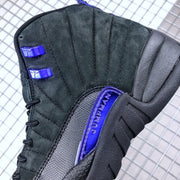 Close-up of the upper with stitched panel lines, purple eyelets, and Jordan side detailing.