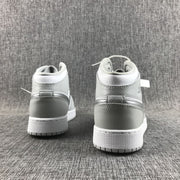 Rear view of the pair showing the heel construction and outsole edges.