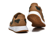 Rear view and outsole view of the brown and dark green-black sneakers.