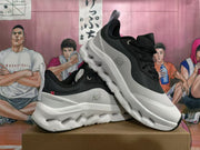 Pair of black and white On sneakers displayed at an angle