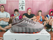 Side view showing the perforated upper, Nike side logo, lace-up closure, and raised textured midsole.