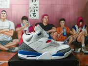 Side view of a white high-top Jordan-style sneaker with blue and red accents and elephant-print overlays.