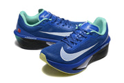 Pair of blue Nike Zoom Fly 6 shoes with white swooshes and mint details