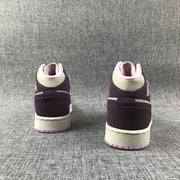 Rear view of the pair showing purple heel panels, white collars, and pink outsoles.
