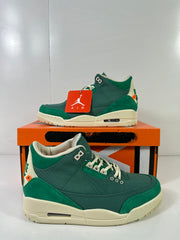 Pair of green and off-white high-top sneakers shown from side and three-quarter views.