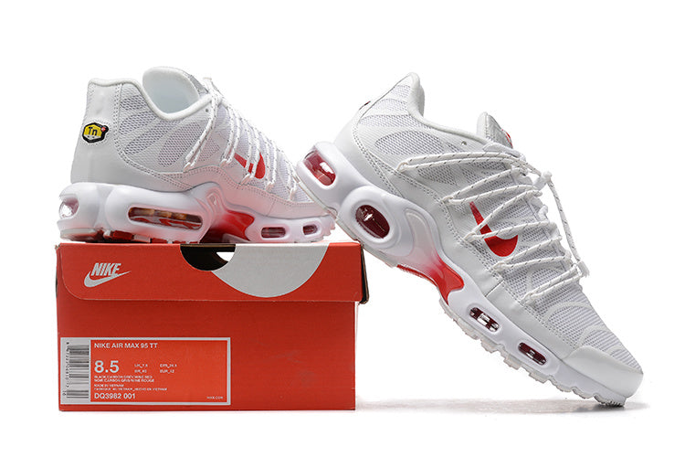 White and red Nike Air Max-style sneakers displayed on a shoe box; the box label shows size 8.5.
