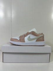Side view highlighting the white side panel, light bone overlays, and pale green-toned Swoosh.