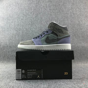 Side-profile product photo placed on a black shoebox labeled Air Jordan 1 Mid SE, with a visible sample size of US 8 and EU 41.