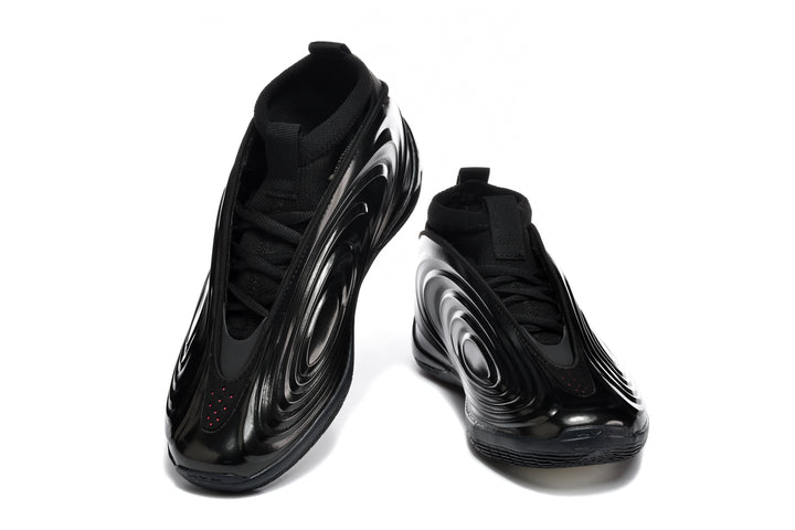Pair of black low-top sneakers shown from the front and side